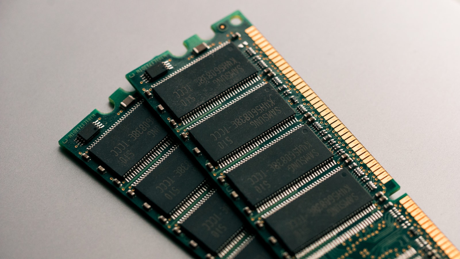 A close-up of a green computer circuit board